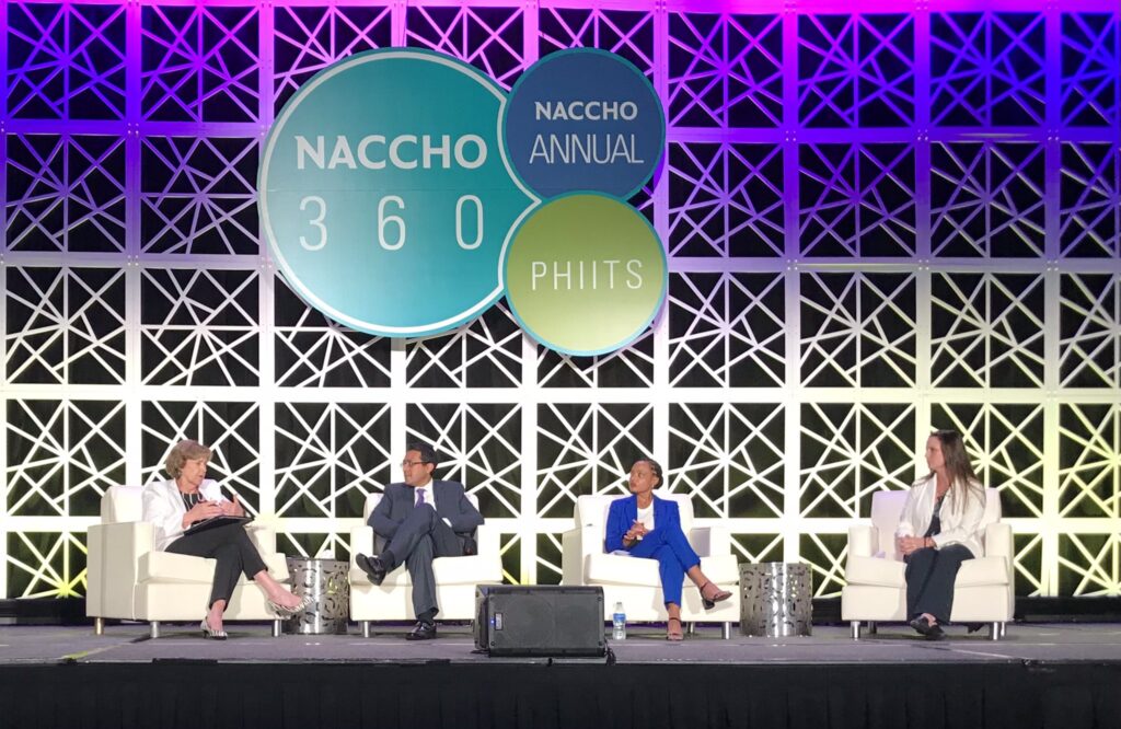 Four people, including Dr. Mysheika Roberts, on stage at NACCHO 360 plenary.