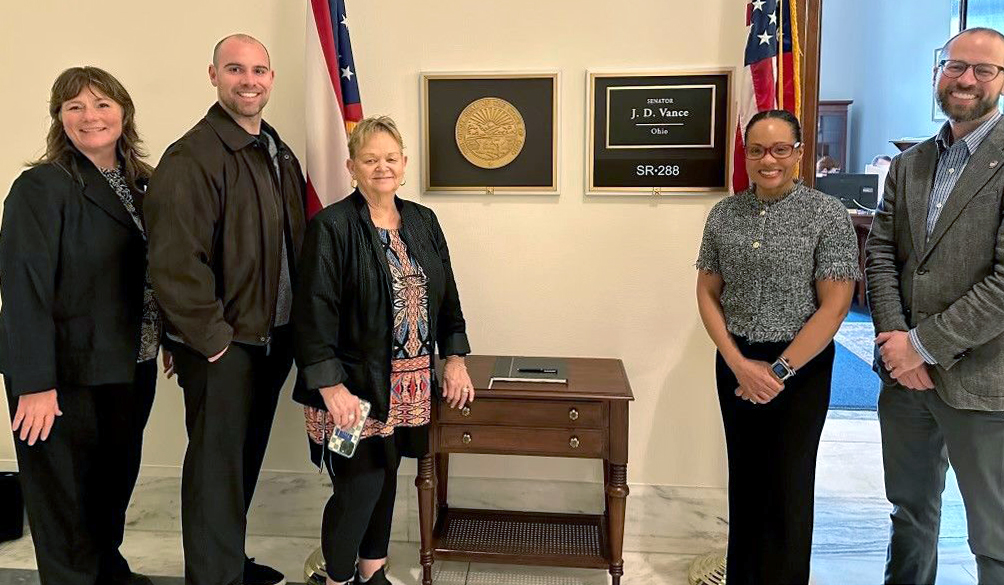 Mysheika Roberts and Dave Margolius in front of then-Sen. J. D. Vance's office