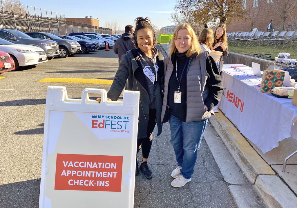 2 DC Health employees at a measles vaccination clinic