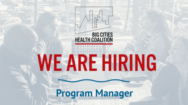 Four people talking and smiling at a table. Text reads: "Big Cities Health Coalition - We are hiring - Program manager"