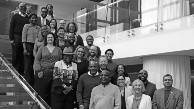 About 25 of BCHC's members standing together on a staircase in Feb. 2024