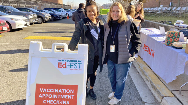 2 DC Health employees at a measles vaccination clinic