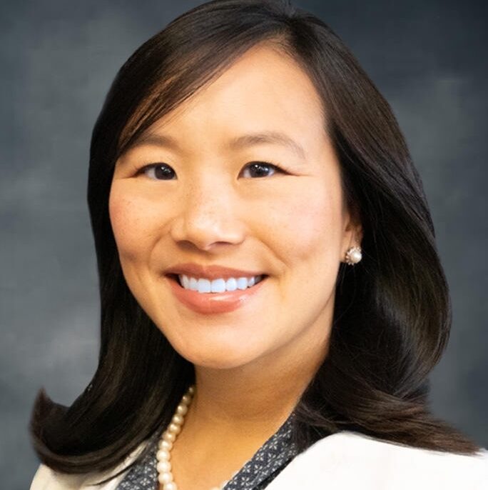 headshot of Theresa Tran Carapucci