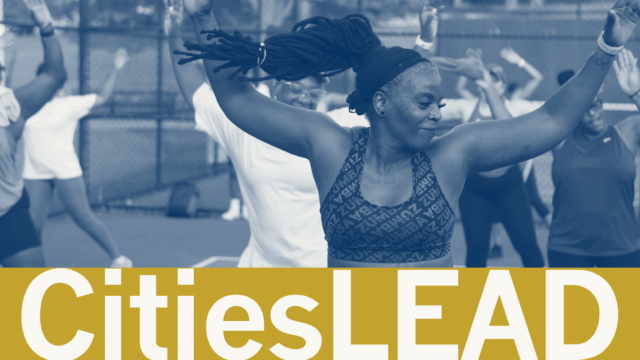 People enjoying an outdoor exercise class in Boston