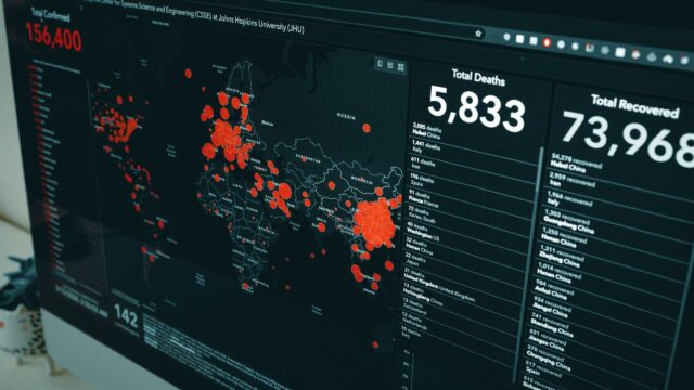 Map on computer screen showing Covid-19 data. Photo by Clay Banks on Unsplash