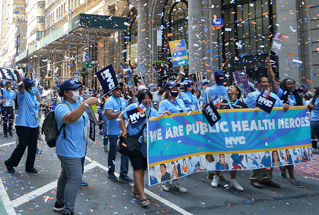 Public health workers marching in a New York City parade