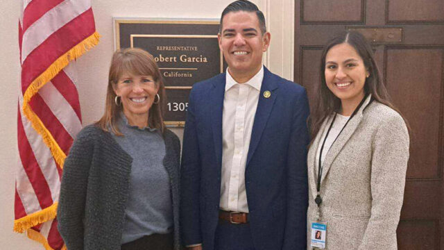 Kelly Colopy and Lluvia Botello chat with Rep. Robert Garcia at his DC office