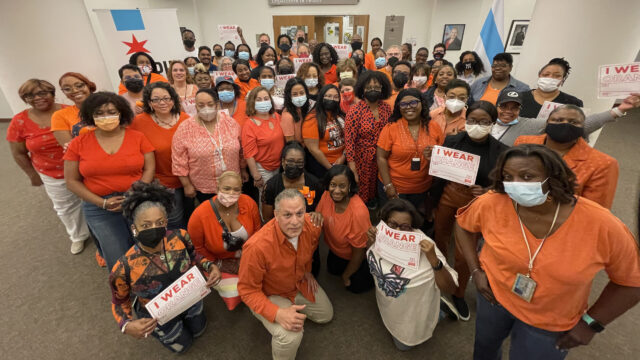 Chicago public health workers wearing orange for violence prevention